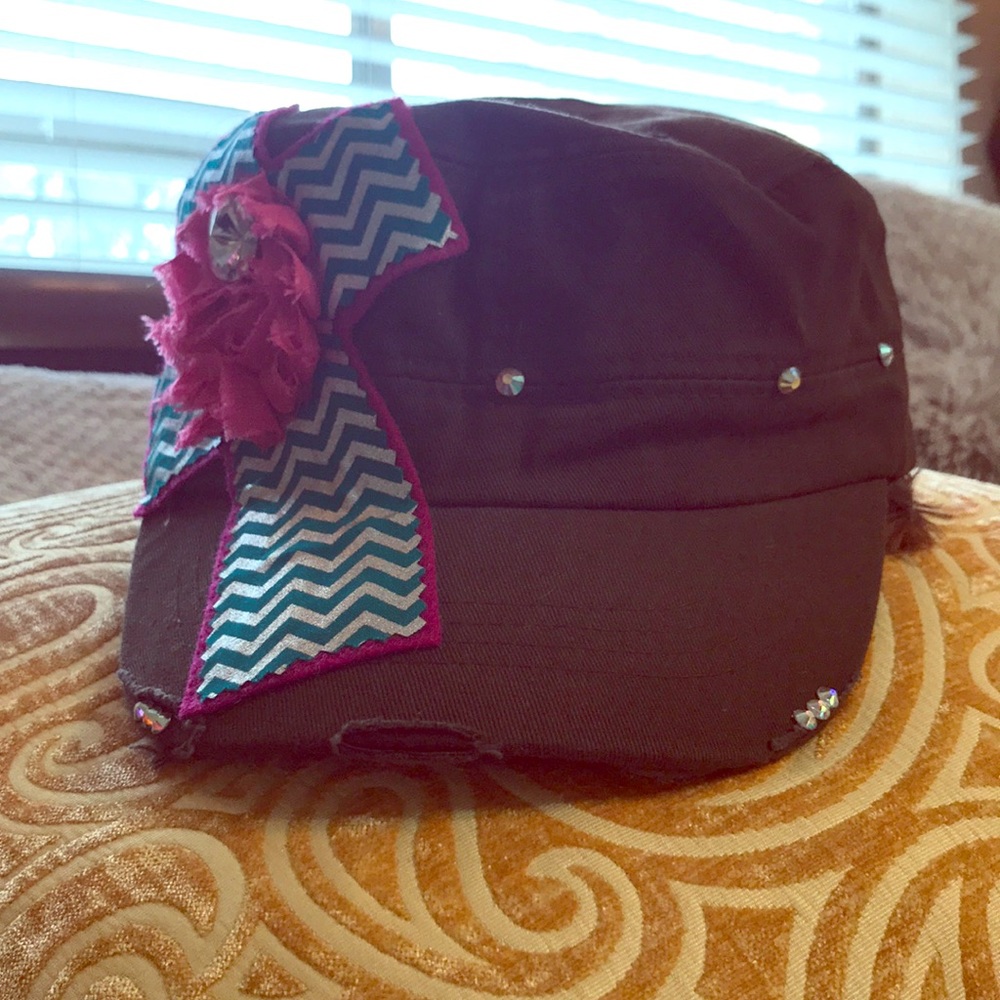 Great hat with a beautiful cross.